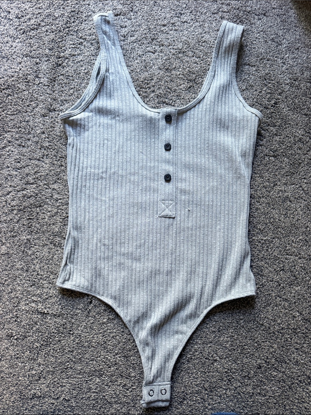 Express woman’s  Ribbed Snap-Back One-Piece Bodysuit in Light Gray